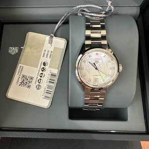 Stunning  TAG HEUER CARRERA
Automatic Watch, 29 mm, Steel
WBN2412.BA0621